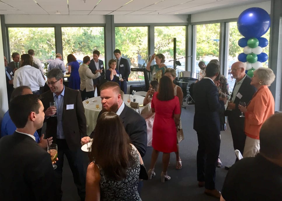 Guests mingling at event hosted by The Tampa Bay Trust Company and Banther Consulting