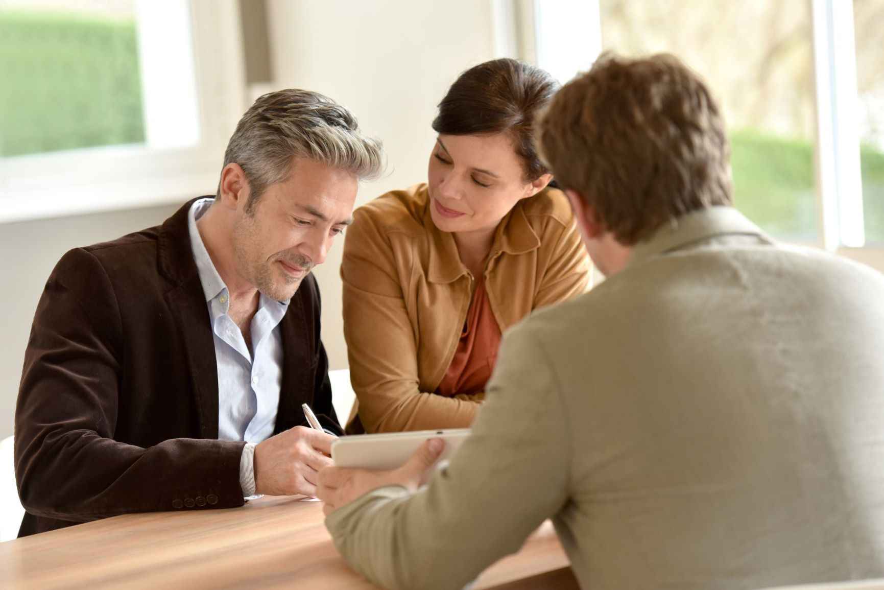 Financial advisor assisting couple with incapacity planning