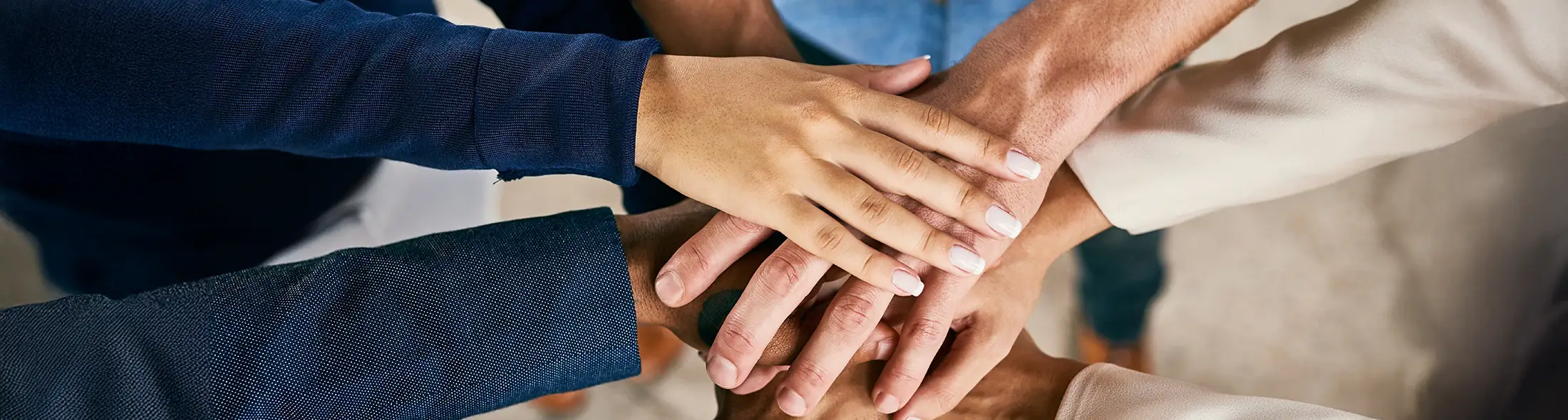 Hands and business people with stack for collaboration.